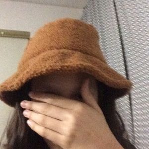 soft fuzzy brown bucket hat